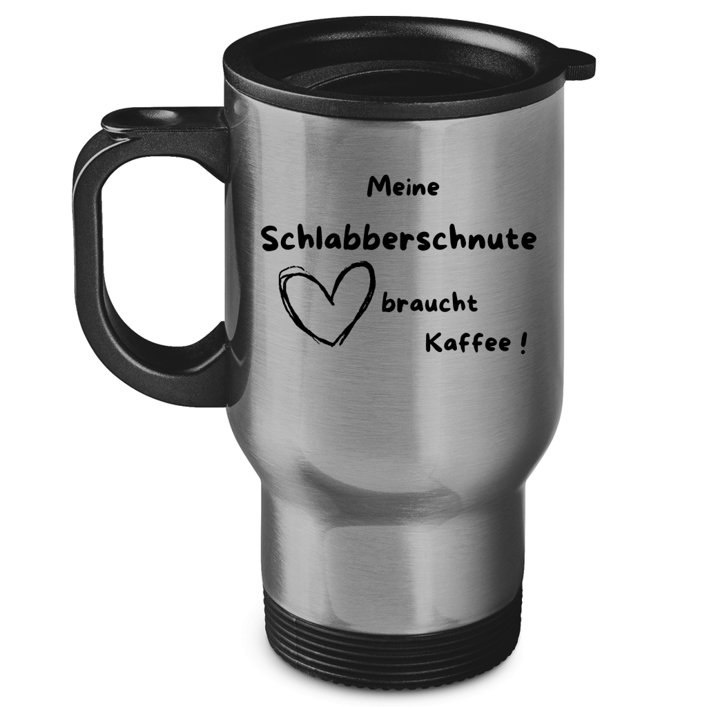 silber Edelstahl Thermobecher mit Spruch „Meine Schlabberschnute braucht Kaffee“ auf Holztisch mit Kaffeezubehör
